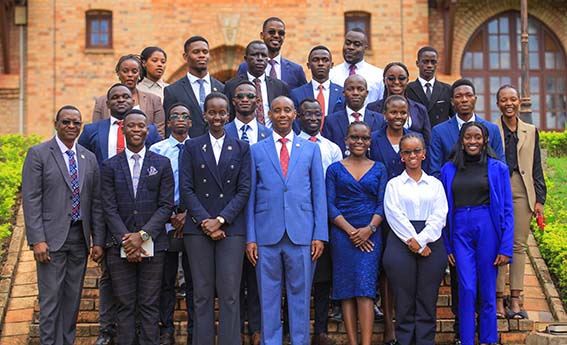 The 27th guild government with the university Vice Chancellor Assoc. Prof. Aaron Mushengyezi (center (blue suit) and Mr. David Mugawe (extreme left, front)