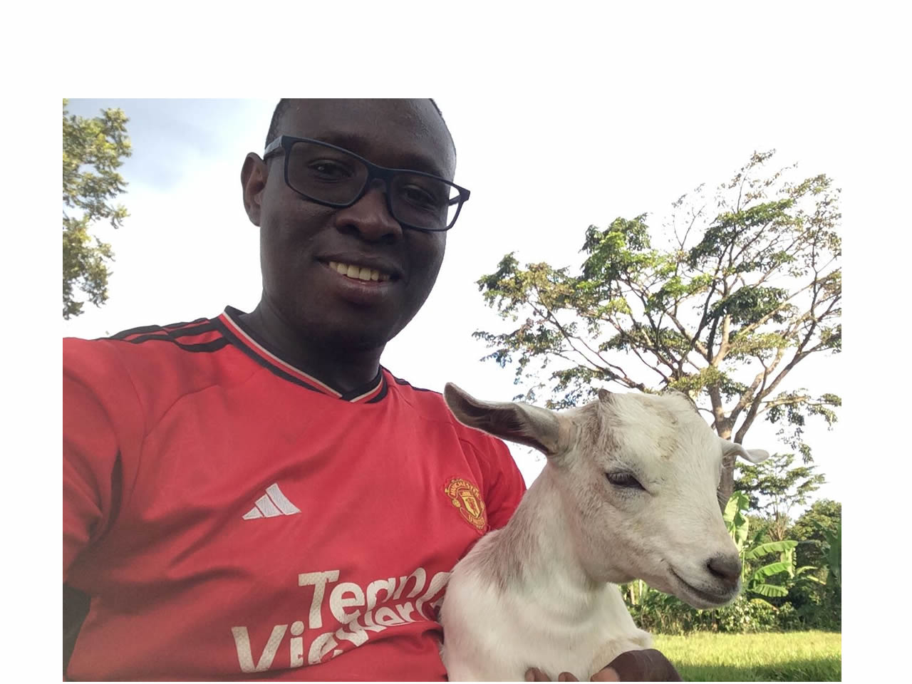 John Lufafa having a light moment with a “kid” at the farm