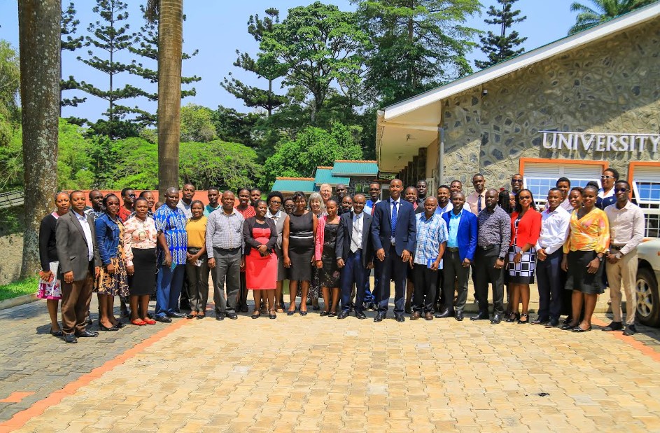 Administrators, academic registrars and facilitators after the seminar with (wearing blue neck tie, in center) UCU Vice Chancellor Assoc. Prof Aaron Mushengyezi