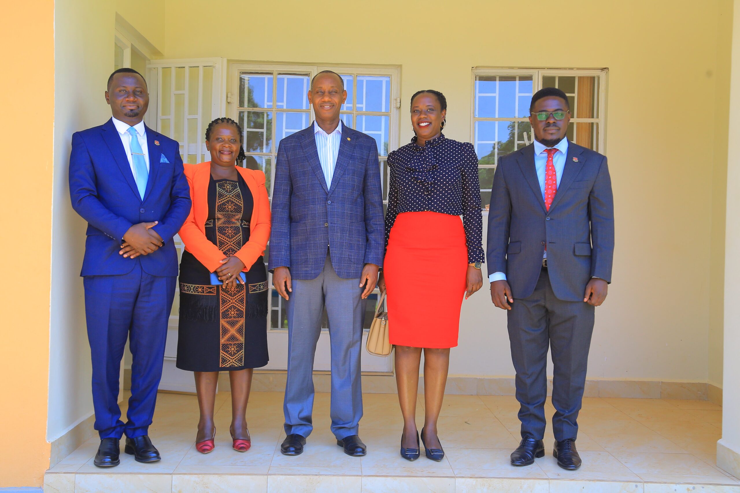 Ronald Beinomugisha Katungi (left) with fellow leaders of the UCU Alumni Association and UCU Vice Chancellor, Prof. Aaron Mushengyezi (center)