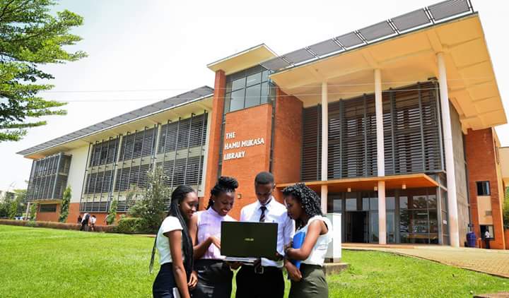 Students in front of Hamu Mukasa Library, built, in part, with USAID monies