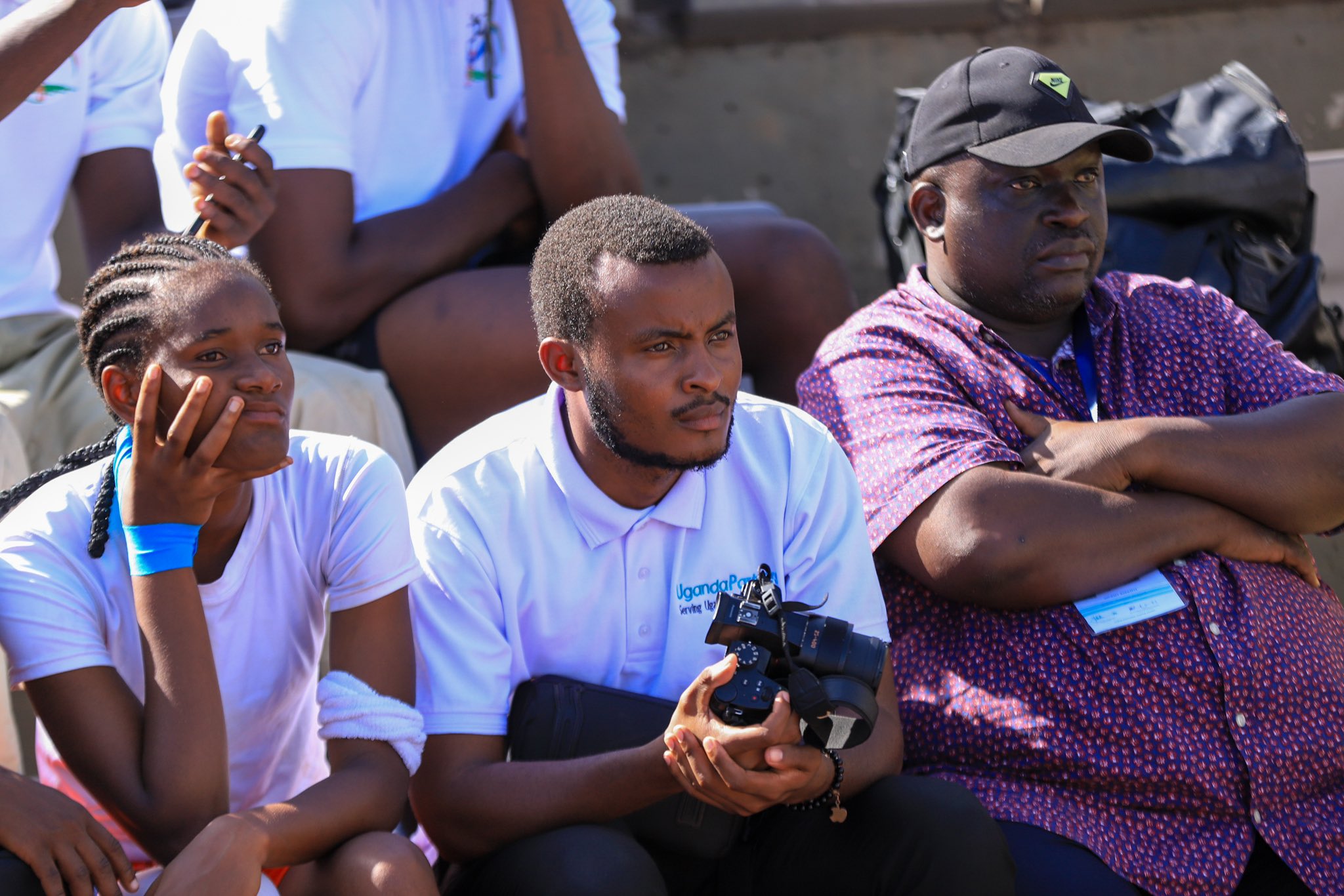 Michael Ainomugisha, center, while at a UCU basketball game.