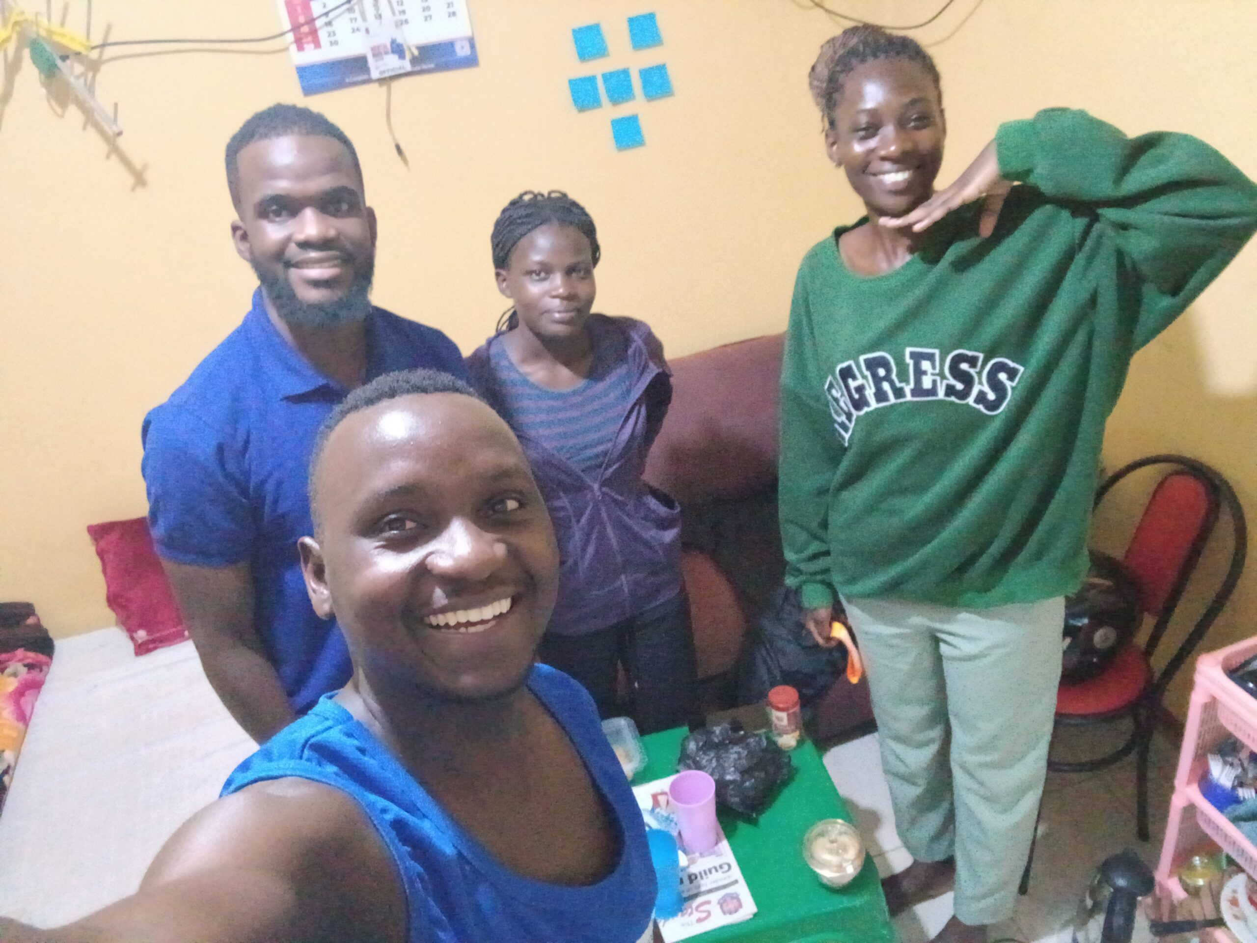 William, left, with friends in his room