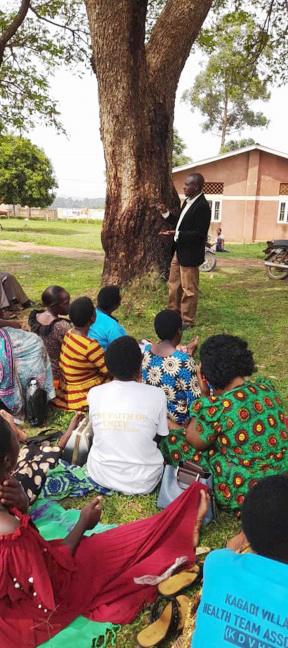 Selevano Thembo communicating to Village Health Teams on community disease surveillance and early reporting