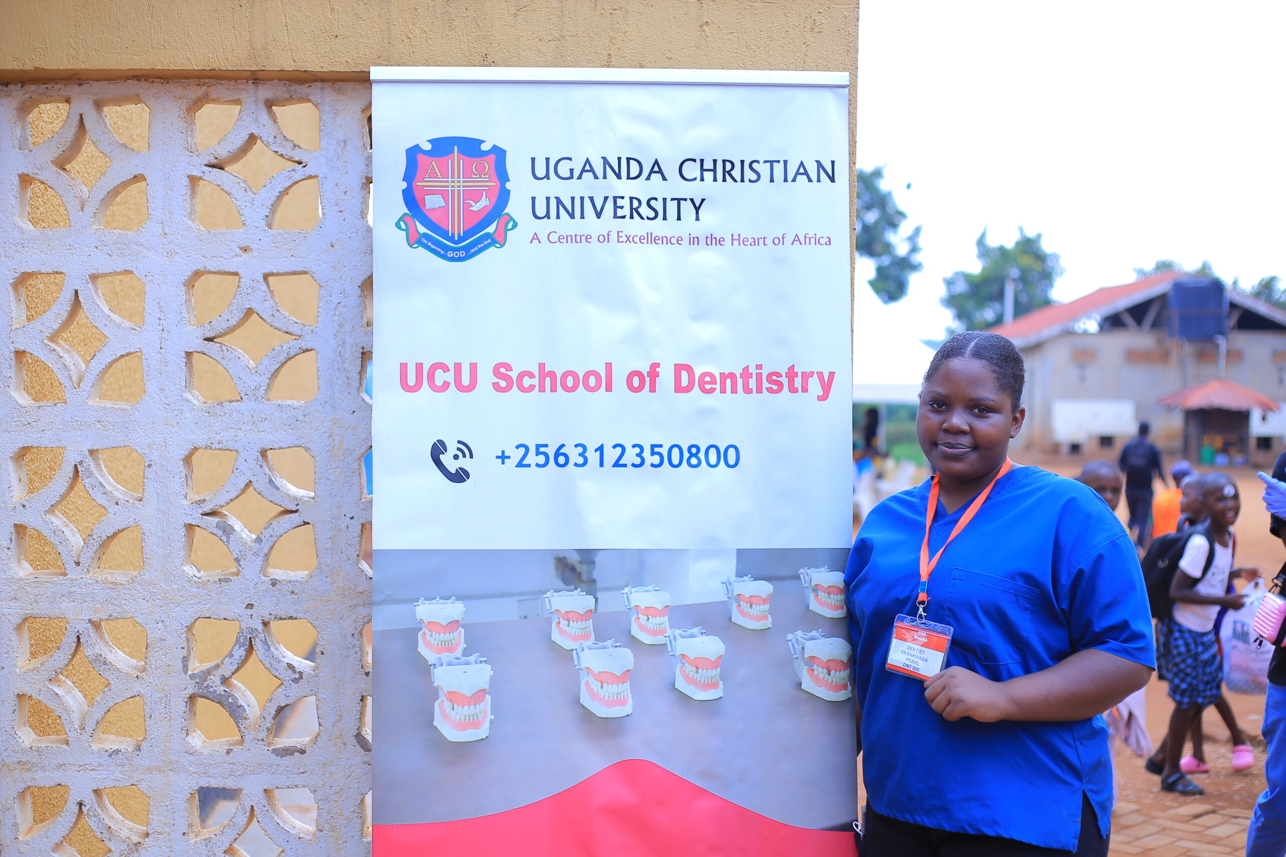 Fifth-year student Pearl Akankwasa takes a break after attending to patients in Bombo, Luwero.
