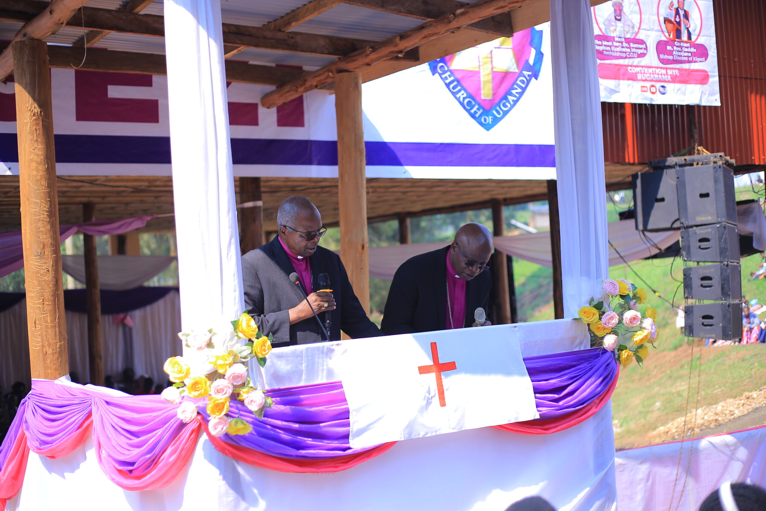 Former Archbishop of the Church of Uganda Henry Luke Orombi (left) with the Bishop of North Kigezi Diocese, Onesimus Asiimwe, during the convention