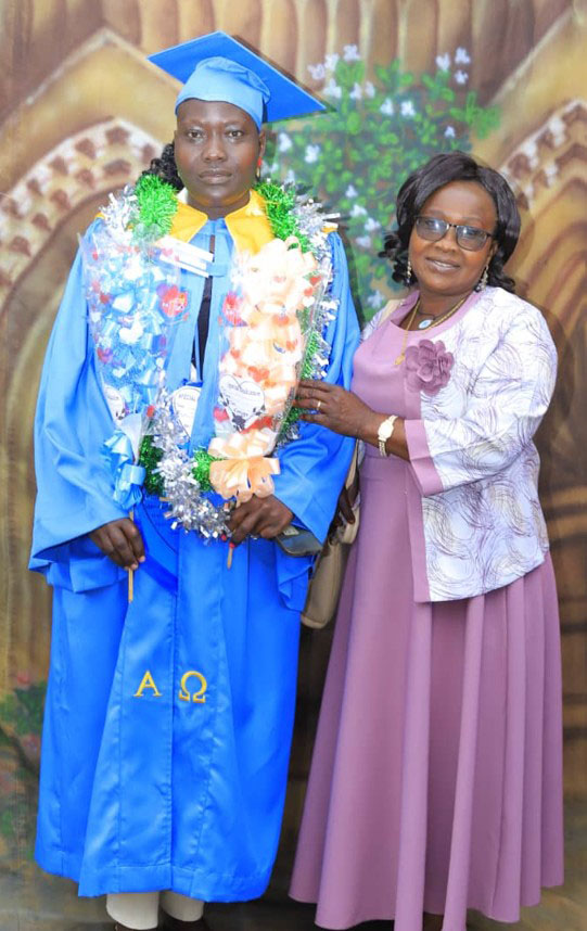 Pamela Simon Kiden and her mother, Martha Dure, on her graduation day