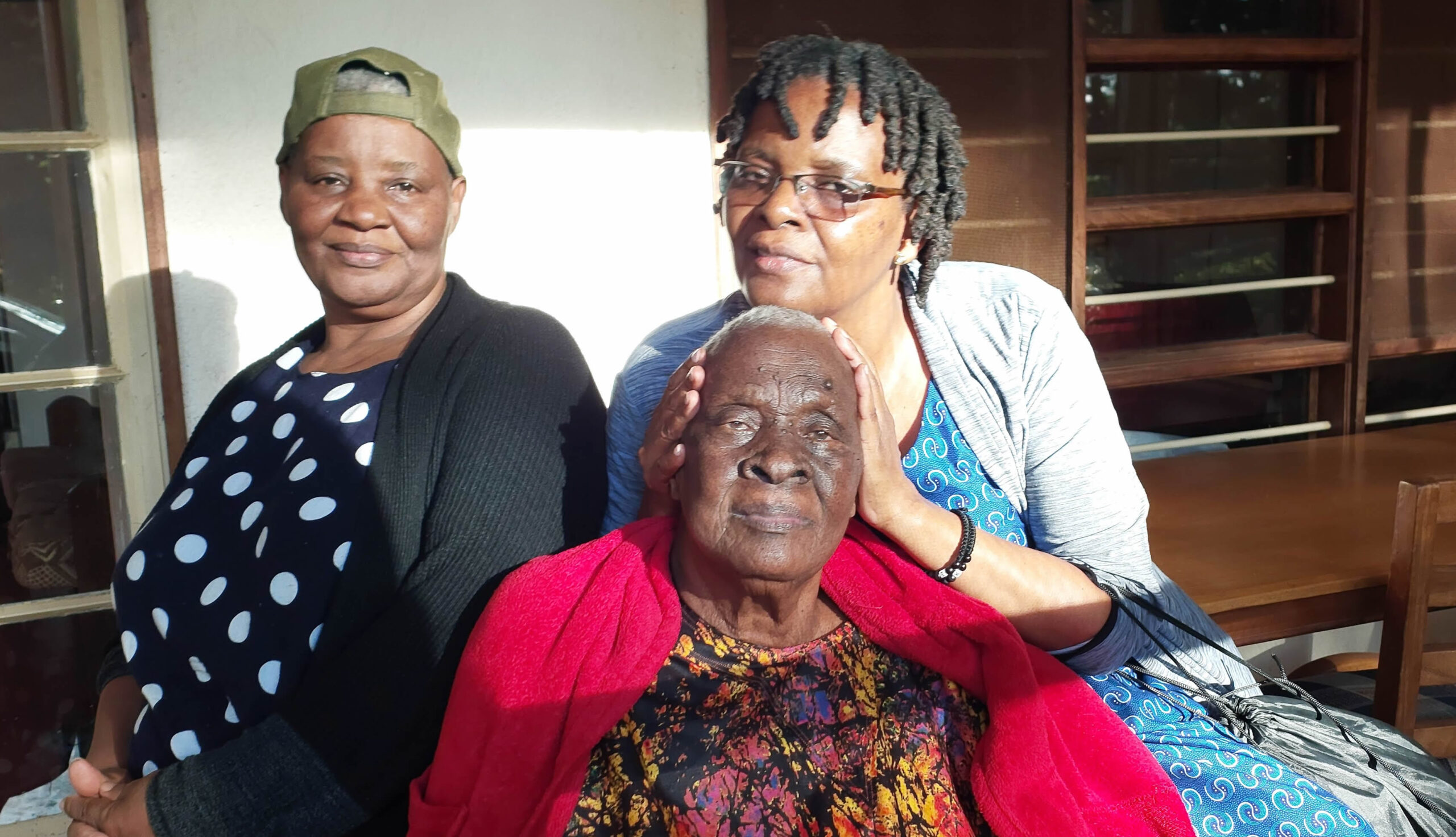 Kukunda Elizabeth Bacwayo with her mother, Beatrice, and her sister, Jolly, at the UCU All Nations House in 2025