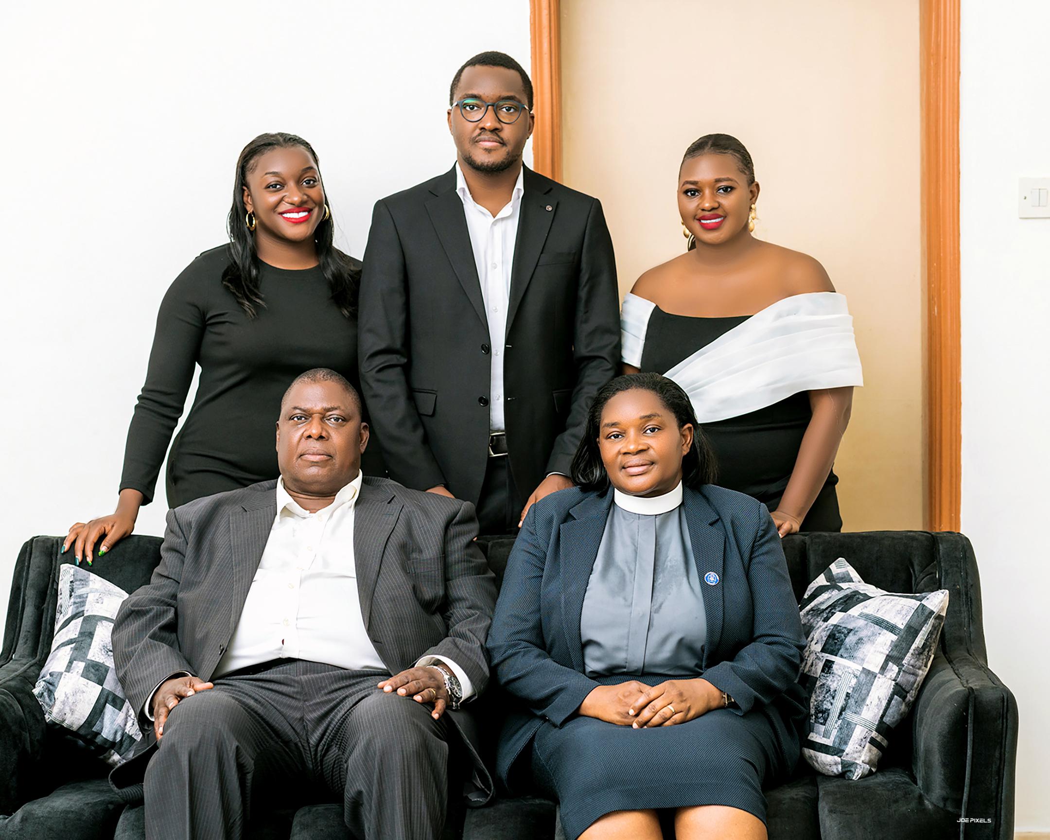 Rebecca and Wilson Nyegenye with their children (left to right, rear) – Winfred Sarah Kwagala, a law magistrate; Dr. Ronald Peter Mukisa, who works in Kenya; and Pricilla Barbra Mirembe, a law advocate