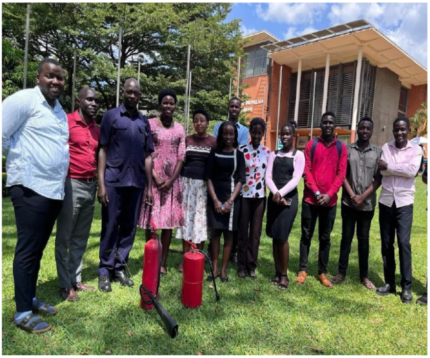 Kisa (second from left) with UCU-Mukono Residential Assistants after a fire safety training