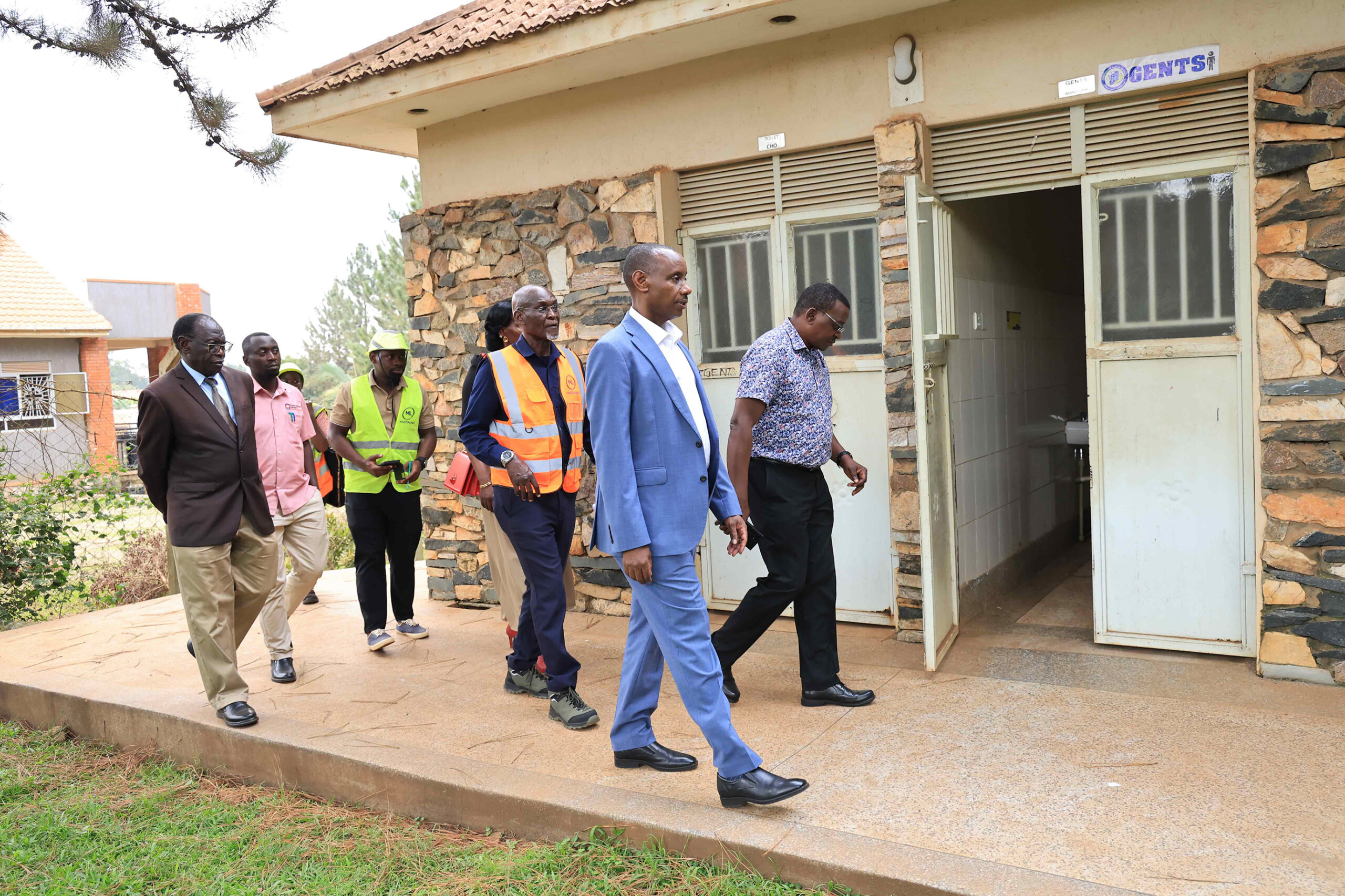 UCU Vice Chancellor, Prof. Aaron Mushengyezi (foreground, left), UCU Vice Chancellor, Finance and Administration (foreground, right) and some members of UCU management inspecting the Anglican site under renovation. Photo by Andrew Bugembe
