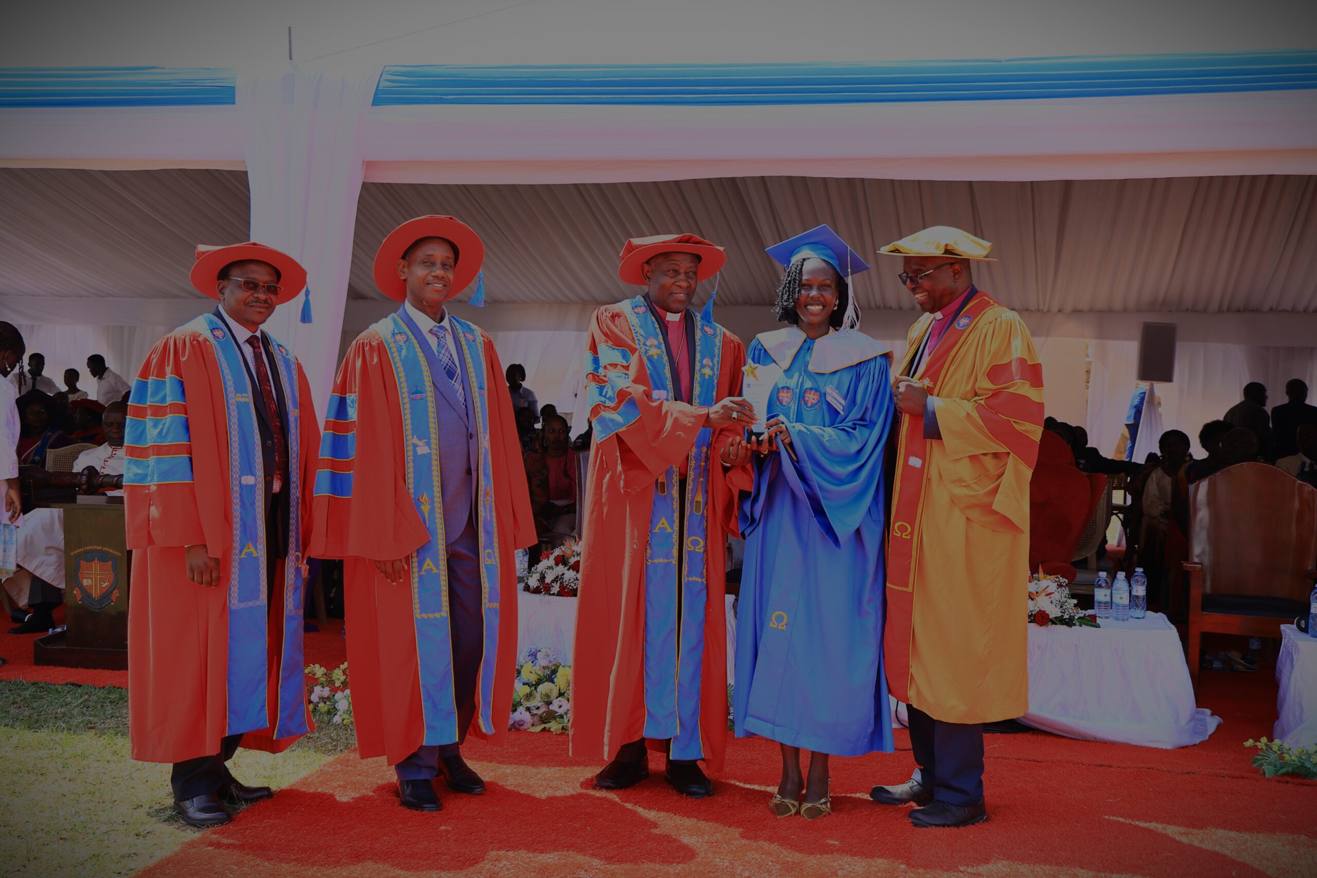 Dawn Acen receives the Overall Best Student award from the Chancellor, Archbishop Stephen Kaziimba Mugalu, during Uganda Christian University’s 26th Graduation Ceremony on July 3, 2026