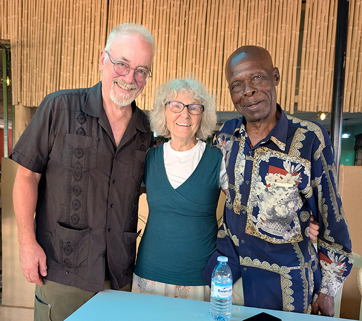 Patty and Mike during a 2026 visit with Epajjar Ojulu, a Ugandan journalist and former supervisor for The Standard where both Patty and Mike volunteered for six weeks in 2013